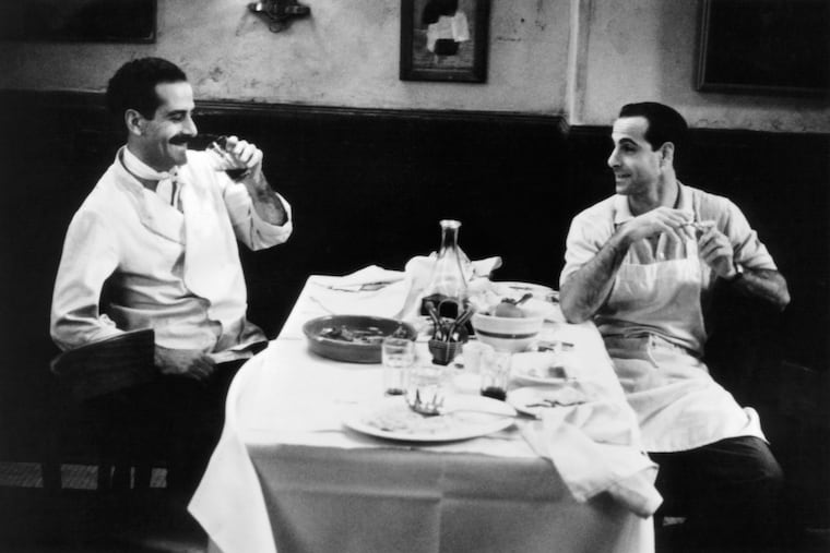 Actors Tony Shalhoub and Stanley Tucci on set of the movie "Big Night" , circa 1996.