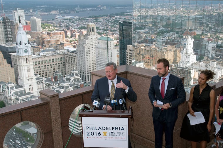 At Top of the Tower at Three Logan Square, Mayor Kenney tells why residents won’t want to flee the city in July. Kevin Washo, executive director of the Philadelphia Host Committee, and Angela Val, deputy executive director, listen.