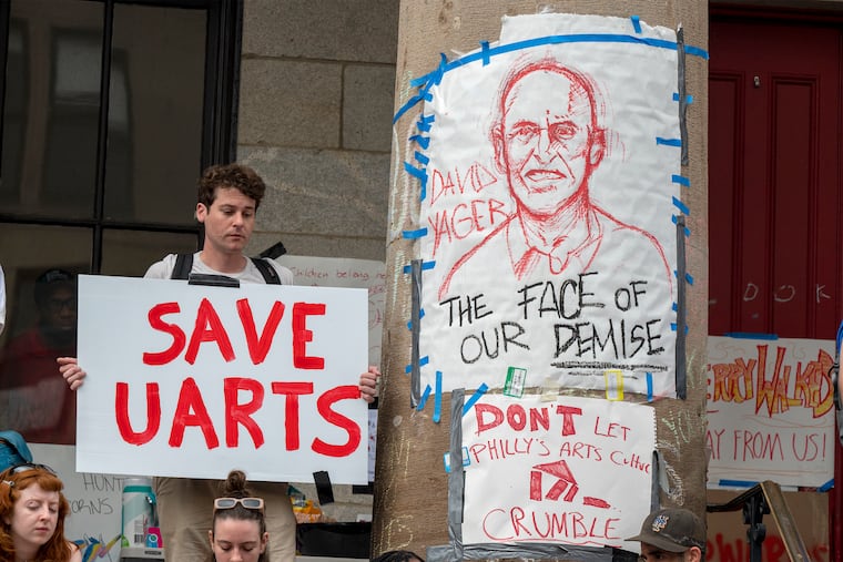 A drawing of David Yager, former president of the University of the Arts, on a column outside Hamilton Hall on its campus in Philadelphia, Wednesday, June 5, 2024, as students, staff, and faculty rally before marching to 1500 Market St. and another rally in front of the former law offices of UArts chair Jud Aaron.