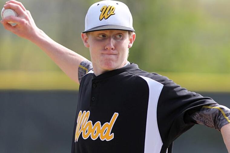 Scott Boches of Archbishop Wood pitches against Archbishop Carroll.
(Charles Fox/Staff Photographer)