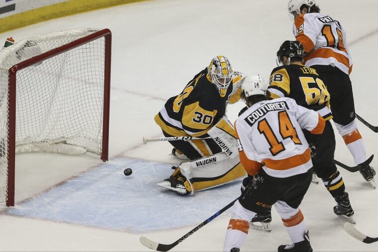 Shayne Gostisbehere’s power-play goal trickles past Pittsburgh goalie Matt Murray to give the Flyers a 1-0 lead late in the first period Friday.