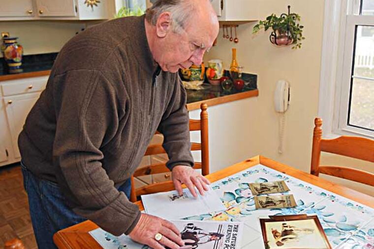 Robert Bazin of Cherry Hill, a retired FBI special agent, is looking copy pictures of stolen paint at his home.( AKIRA SUWA / Staff Photographer )
Robert Bazin of Cherry Hill, a retired FBI special agent, is on the hunt for an original Norman Rockwell that was stolen from a Cherry Hill home in 1976.