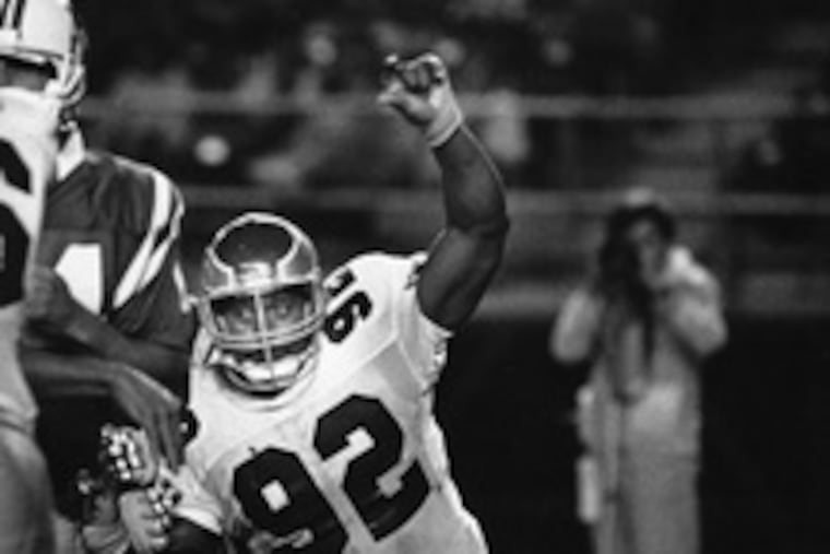 Reggie White chases down a quarterback in 1988. White led the NFL in sacks that season (18), as he had in 1987 (21).