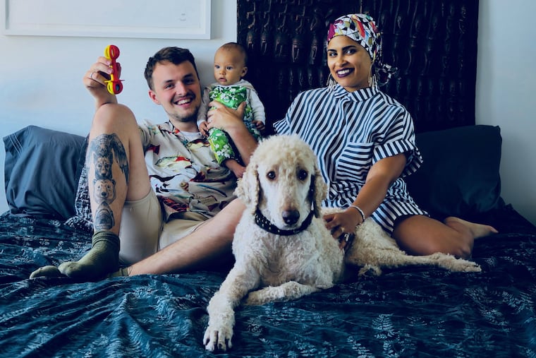 Martijn and Amalea with Travis and their standard poodle, Hairo.