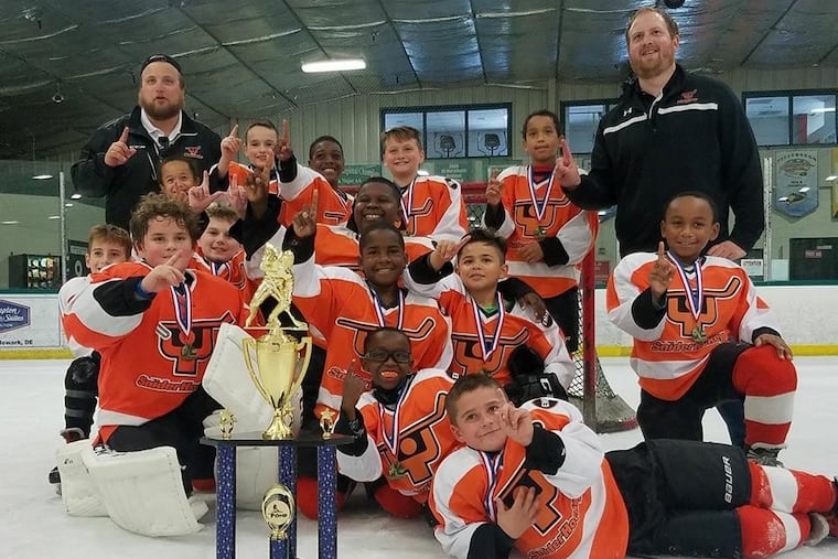Snider Hockey uses the sport as a hook to educate young players from "crayons to careers," said president Scott Tharp.