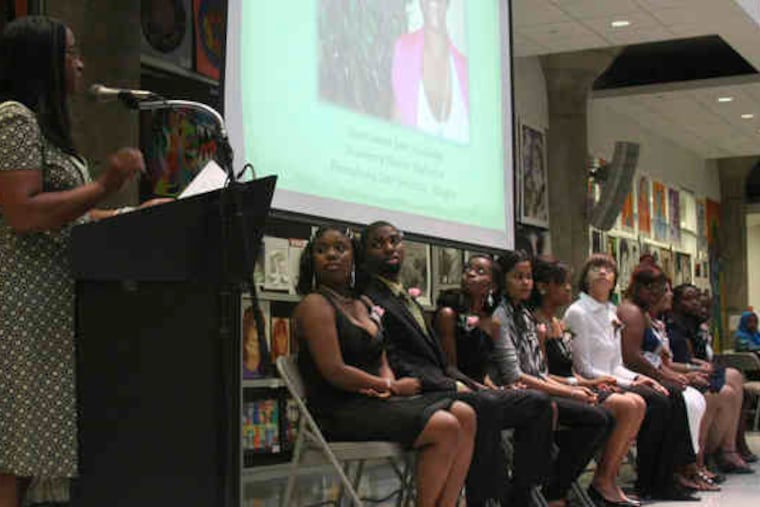 ROBYN JONES announces the winner of the 2010 Susan Cannon Jones Celebration Scholarship, Donyel Gaymon (not present), during the Ivy Legacy Foundation's annual scholarship awards reception last night at the School District of Philadelphia headquarters.