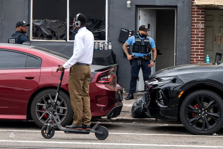 Major Crime detectives and police officers were on the scene August 16 at Elmwood Avenue and South 73rd Streets where an off-duty police officer died after the was shot at an after-hours lounge near the intersection.