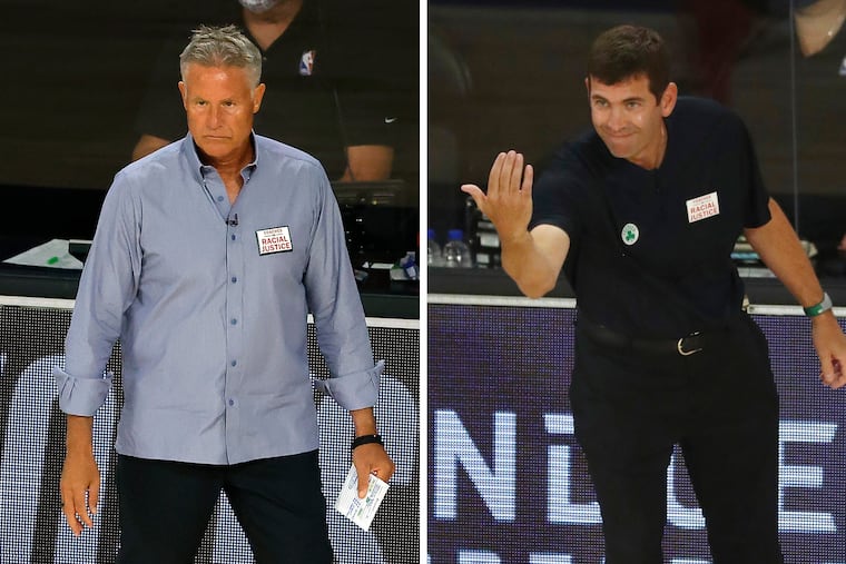 Coaches Brett Brown (left) and Brad Stevens