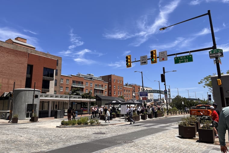 Philadelphia city officials celebrated the completion of a $16 million renovation of Market Street, from Sixth to Second Streets. Improvements include wider sidewalks, protected bike lanes, Belgian block streetscape, and new plantings.