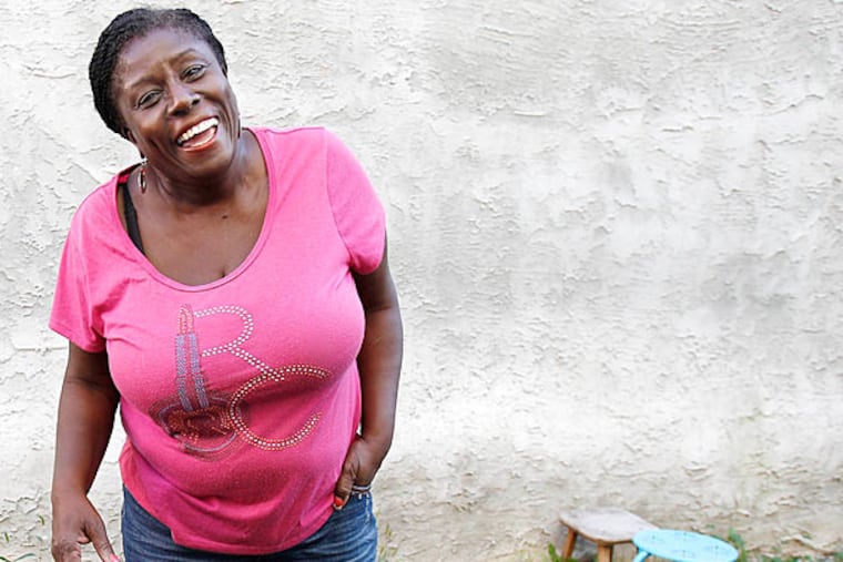 Paula Mae Willis, 58, grows kale, cabbage, collard greens, tomatoes and butternut squash to make home-cooked meals that she sells for $3 to $5 a plate to a loyal clientele of locals. DAVID MAIALETTI / STAFF PHOTOGRAPHER