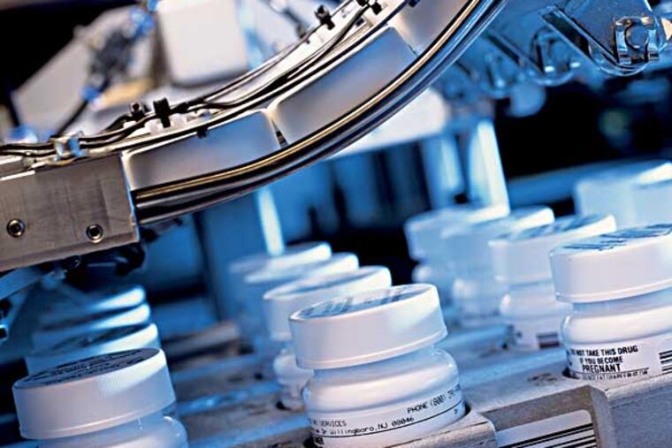 A dozen years after Medco Health opened the nation's largest pharmaceutical distribution center in a dilapidated shopping center in Willingboro,it now plans to relocate to Florence, a few miles away, this summer, under the mantle of new owners, Express Scripts.This is the inside of the Willingbor facility showing it shows the automation at the factory.