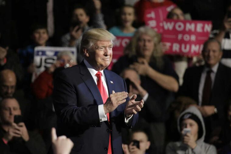 President-Elect Donald Trump arrives on stage at the Giant Center in Hershey on Thursday.