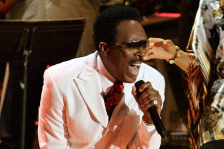 In this May 23, 2007 file photo, Jessy Dixon, left, performs with Yolanda Adams in Washington. (AP Photo/Haraz N. Ghanbari, File)