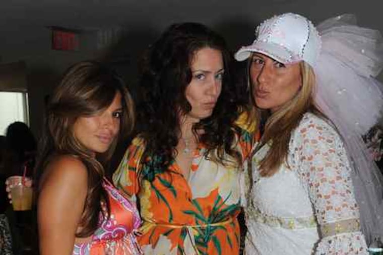 Center City socialite Sabrina Tamburino (right) of the Greater Philadelphia Marketing Corp. at her bridal shower last Sunday with Kelly Coia (left) and actress Joely Fisher. Coia is married to the Seattle Seahawks' Julius Jones.