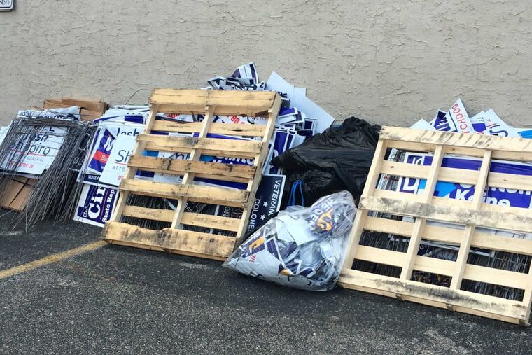 Recycled campaign signs at a Norristown drop-off center await apolitical futures.