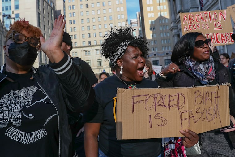 Protesters in support of abortion rights gather at City Hall in Philadelphia on Tuesday, May 3, 2022. Protests took place in Philadelphia and the region after a leak revealed that the U.S. Supreme Court had drafted an opinion to overturn Roe v. Wade.