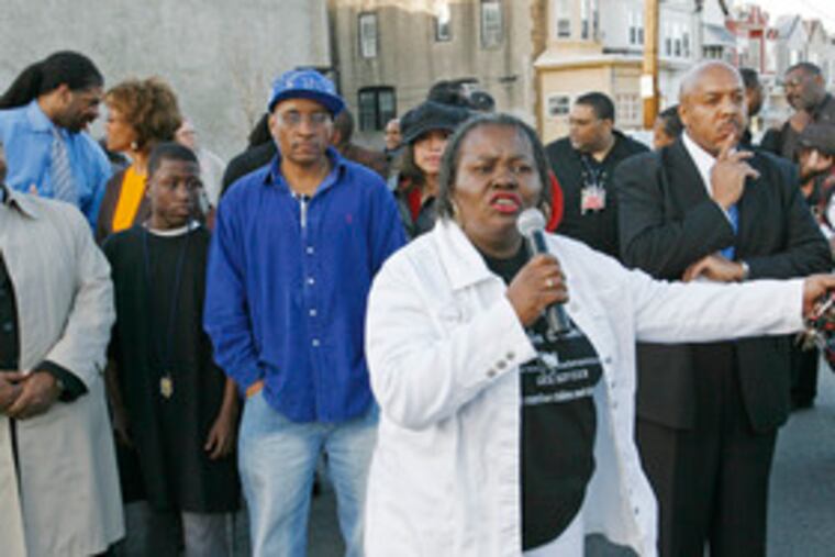 Shirley Boggs of Mothers United Through Tragedy addresses the Kingsessing rally. Her son Quentell Boggs was a homicide victim.