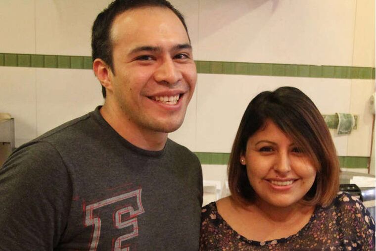 Luis Lorenzo and Nora Portugal, who own Nora's at 248 South St. ( Michael Klein / Philly.com )
