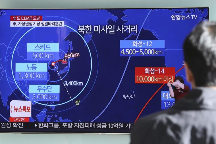 At the Seoul Railway Station, man watches a local news program reporting Wednesday about North Korea’s most recent missile launch.