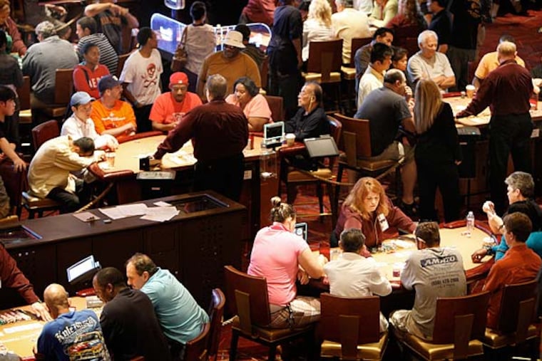 The table games are shown at Harrah's Chester. Caesar's, which operates the casino, got sold Monday to a much smaller firm. (David Maialetti / Staff Photographer)