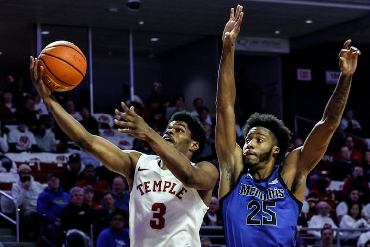 Hysier Miller of Temple shoots pas Memphis Jayden Hardaway on Feb. 8. The Owls beat UTSA in the first round of AAC men’s tournament on Wednesday.