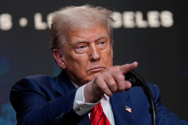 President Donald Trump speaks before signing an executive order about the 2028 Los Angeles Olympic Games, in the South Court Auditorium of the Eisenhower Executive Office Building on the White House campus on Tuesday in Washington.