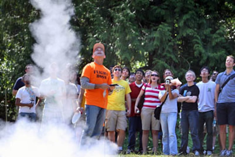 Steven Sinofsky, president of Microsoft's Windows division, launches the first of many Microsoft intern-built model rockets at Vasa Park in southeast Bellevue, Washington, July 31, 2009. The event in July commemorated the 40th anniversary of the first moon landing. (Steve Ringman / Seattle Times / MCT)