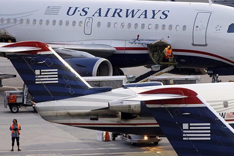 Turbulence injured six on US Airways flight from Philadelphia to Florida on Sunday (ELISE AMENDOLA / Associated Press / File)