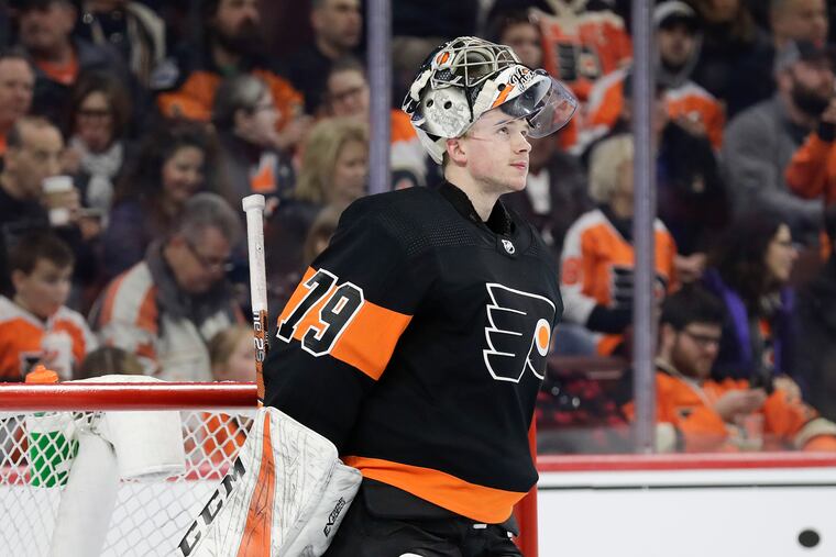 Flyers goaltender Carter Hart in front of his net during a break against the Detroit Red Wings on Saturday, February 16, 2019 in Philadelphia.
