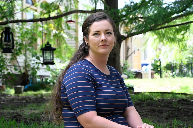 Brittnee Nelson, who had fraudulent student loans taken out in her name, poses for a portrait in her neighborhood in Shreveport, La., Monday, June 9, 2025.