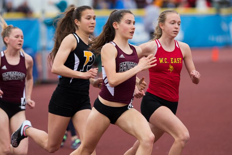 West Chester Henderson's Jenna Mulhern (center) likes to stay close to the leaders and make her move to the front when the time is right.