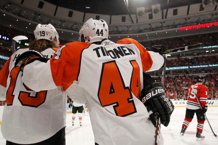 Scott Hartnell, Kimmo Timonen celebrate goal during Game 5 of 2010 Stanley Cup finals in Chicago.(Associated Press)