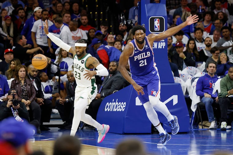 The Sixers' Joel Embiid tracks the ball during a game against the Milwaukee Bucks at the Wells Fargo Center.