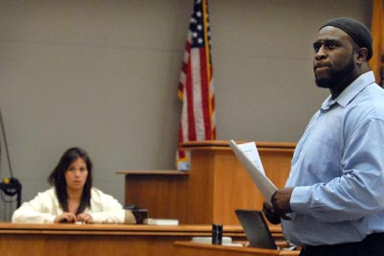 Floyd Tally, right, cross-examines Kristyn Haino, the former prostitute allegedly hired to seduce Councilman Eugene Robinson. (AP Photo/Press of Atlantic City, Danny Drake)