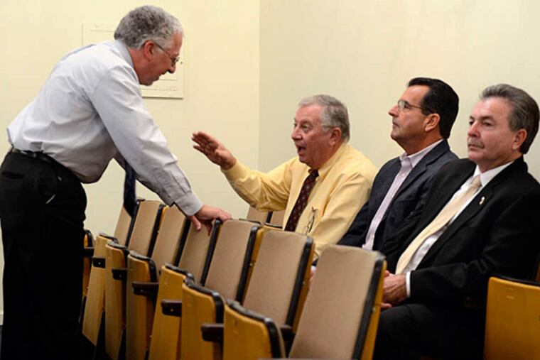 Republican incumbent John Amodeo (second from right) waiting in a Mays Landing courtroom Dec. 3, during the recount of votes. He conceded the Second District Assembly race on Tuesday. (Tom Gralish/Staff)