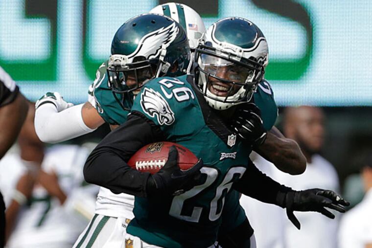 Philadelphia Eagles strong safety Walter Thurmond (26) celebrates with
teammates after intercepting a pass against the New York Jets during
the fourth quarter of an NFL football game, Sunday, Sept. 27, 2015, in
East Rutherford, N.J.