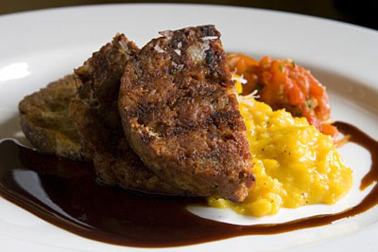 Local goose eggs are soft-scrambled with the Moroccan spice of house-made merguez sausage. (Akira Suwa / Staff Photographer)