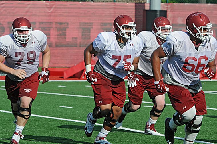 Temple offensive linemen Kyle Friend, Shahbaz Ahmed, Brendan McGowan and Dion Dawkins.