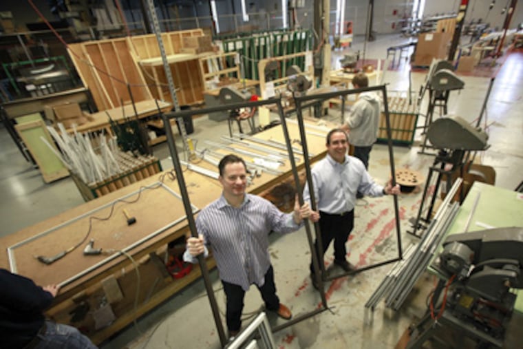 John Siegel and Jay Reyher (right) of Quanta Technologies, Inc., of Lancaster. (David Swanson / Staff Photographer)