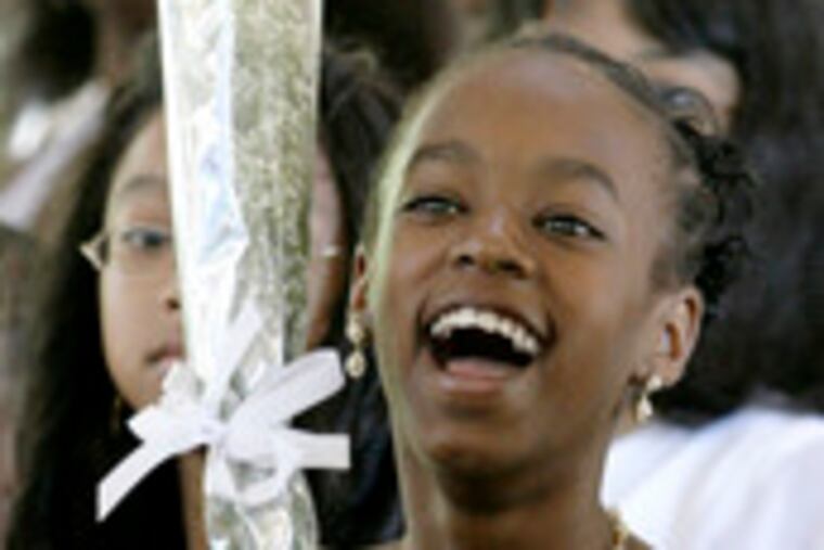 Shabri Worthey receives her graduation certificate from the Steppingstone program.