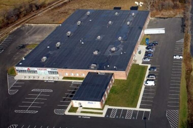 The 61,000-square-foot building at 2801 Grant Ave., near Northeast Philadelphia Airport, has been sold to the Philadelphia-based Iron Stone Strategic Capital Partners. (NAI Mertz)