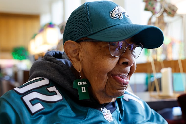 102-year-old Eagles super fan Eloise Brown wears her Eagles wide receiver A.J. Brown earring at the Hilton Riverside in New Orleans on Feb. 8.