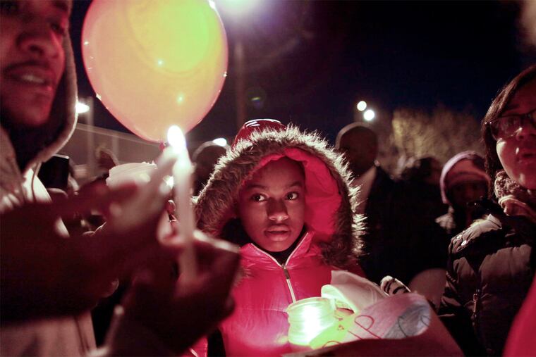 Friends and family members pay tribute to Edward Barksdale at the Station House Homeless Facility in North Philadelphia in January.