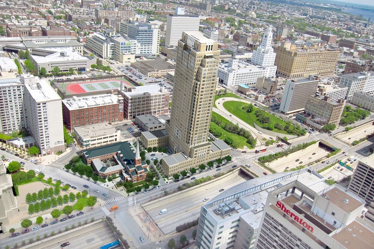 An artist's rendering of the Alexander, being built by the development arm of the Mormon Church. The tower, about a block from the recently completed Philadelphia Pennsylvania Temple, will be a 277-unit mixed-use complex. Flynn Co. offices are in its shadow.