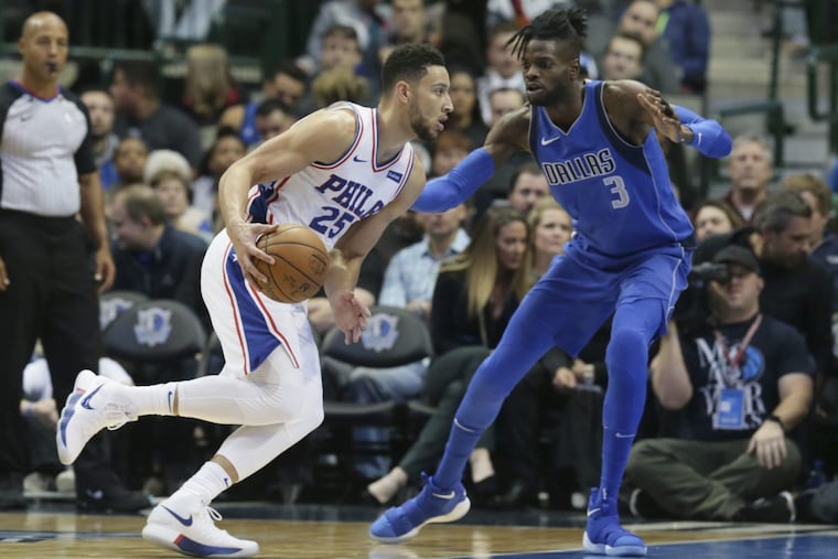 Ben Simmons (25) drives against Mavericks forward Nerlens Noel on Saturday.