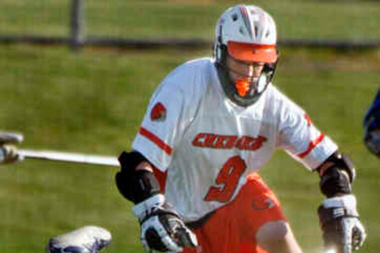 Cherokee's Frank Garvey (right) leaves Washington Township's Steve Orsini behind after winning a battle for the ball.