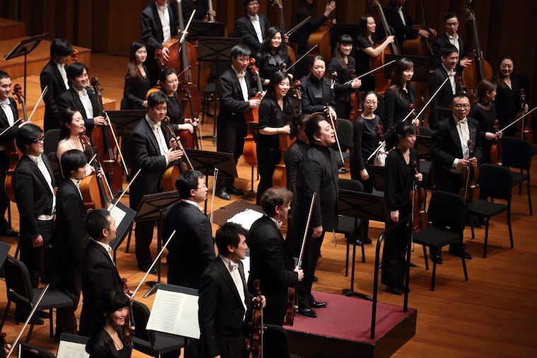 The National Centre for the Performing Arts Orchestra with chief conductor Lü Jia.