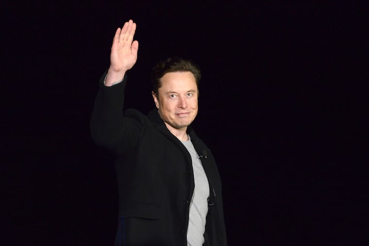 SpaceX's Elon Musk waves while providing an update on Starship in February near Brownsville, Texas.
