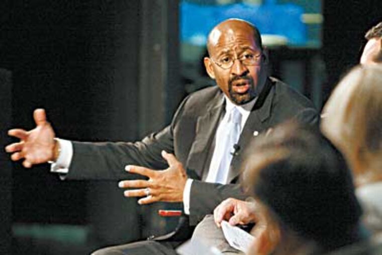 Mayor Nutter answers a question during a meeting about PennPraxis' 10-step action plan for the Delaware River waterfront development. Step one is a sweeping overhaul of the Penn's Landing Corp. (Elizabeth Robertson / Inquirer Staff)