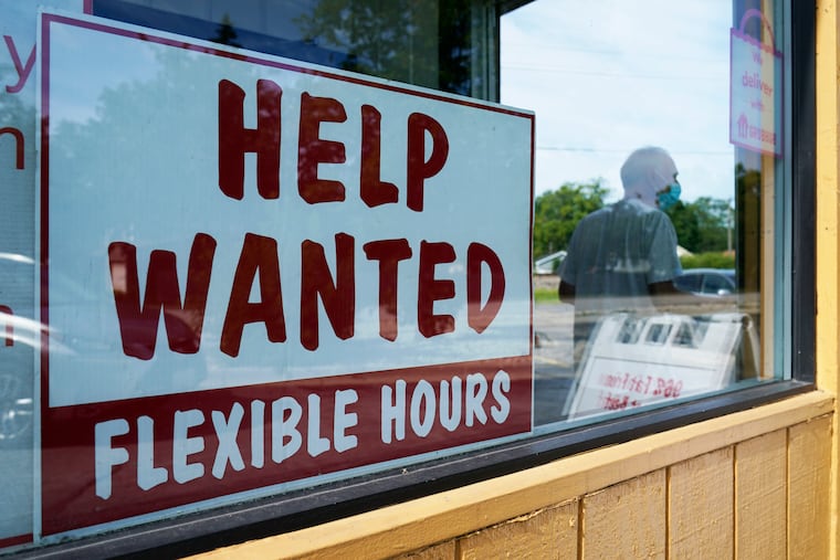 File - A help wanted sign is displayed in Deerfield, Ill., in 2022. On Thursday, the Labor Department reports on the number of people who applied for unemployment benefits last week